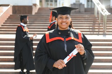 pretty african female college graduate at graduation