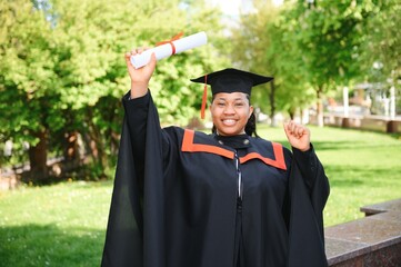 pretty african female college graduate at graduation