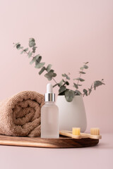 Bath towel, serum bottle and bamboo toothbrushes