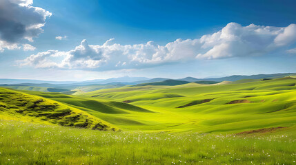 Serene green hills under blue sky