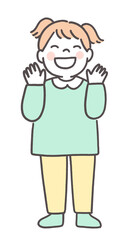 手をあげる笑顔の女の子