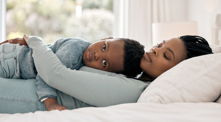 Portrait, boy and mother in bed with hug, support and childhood development for love and affection....