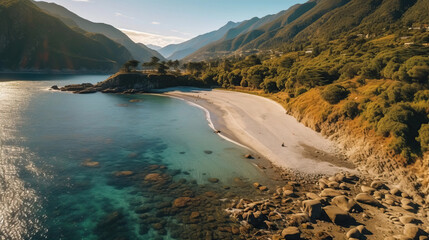 Drone view of beautiful beach with sand and rock surrounded by mountains in the sunny day. Aerial Landscape concept.