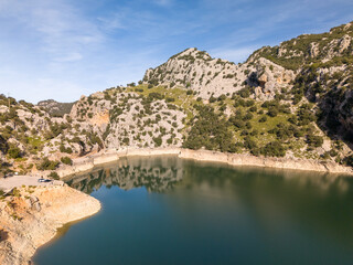 Lake with trees and people in the mountains: Mallorca, Gorg Blau lake