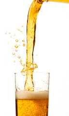 Refreshing Golden Beer Pouring with Bubbles and Foam into a Glass