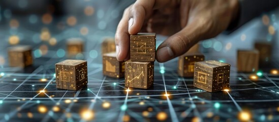 Obraz premium Hand putting wooden blocks with digital network connection on white background wooden block structure. Digital marketing concept