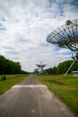 The Westerbork Synthesis Radio Telescope (WSRT), also known as Westerbork Radio Observatory, is a radio telescope consisting of fourteen separate parabolic antennas in the forests near Hooghalen 