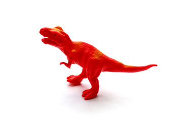 Plastic dinosaur toys on white background