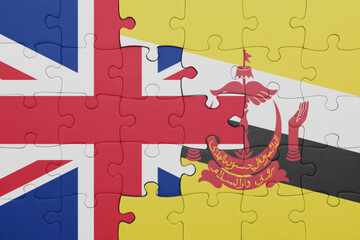 puzzle with the colourful national flag of brunei and flag of great britain.