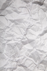 Piece of white wrinkled paper texture background 