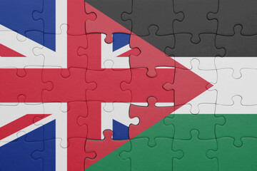 puzzle with the colourful national flag of jordan and flag of great britain.