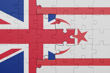 puzzle with the colourful national flag of northern cyprus and flag of great britain.