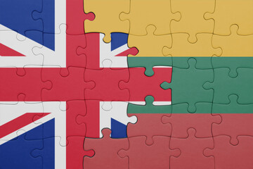 puzzle with the colourful national flag of lithuania and flag of great britain.