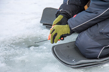 Winter frosty fishing on the river. Winter fishing.