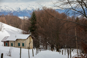 beautiful landscapes of the snowy mountains of lake como, north italy