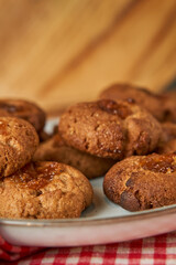 A bowl with pepas cookies on a table