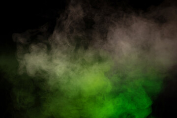 Green and white steam on a black background.