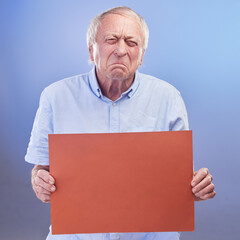 Sad, sign and senior man with poster with info for pension and life insurance mockup in studio...