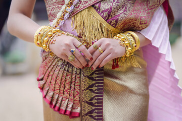 Pretty Asian women in traditional Thai dress. Beautiful traditional Thai dresses by Asian Buddhists...