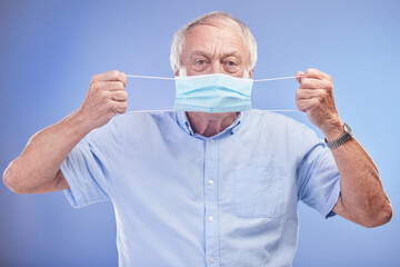 Elderly man, portrait and face mask for germs in studio, promote healthcare and prevention of...