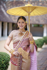 Pretty Asian women in traditional Thai dress. Beautiful traditional Thai dresses by Asian Buddhists...