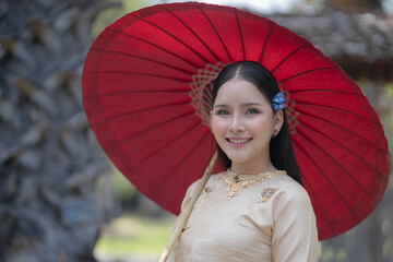 Pretty Asian women in traditional Thai dress. Beautiful traditional Thai dresses by Asian Buddhists...