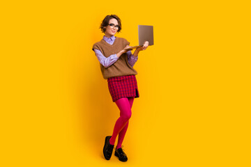 Photo of attractive woman netbook instagram twitter facebook telegram dressed retro office clothes...