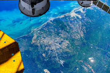 Satellite view of a coastal city in Louisiana State, USA. Digital enhancement of an image by NASA