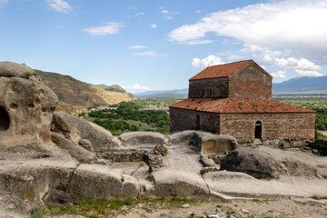 Uplistsikhe, Georgia, View of Ancient Cave Town and Church in Georgia with beautiful landscape