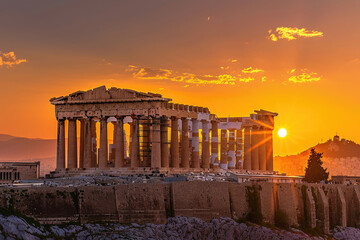 The Parthenon glowing in the setting sun with Athens sprawling below