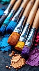 Very old used and messy water color paint box with a brush