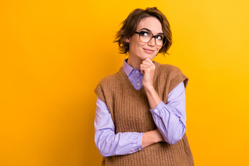 Photo of clever girl with bob hairdo dressed knit waistcoat in glasses look at discount empty space...