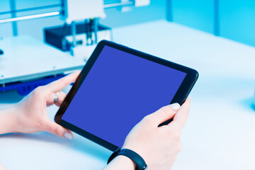 tablet with blue screen in modern technology laboratory