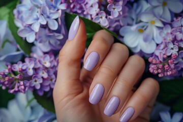 Hand Model With Long Nails Painted With A Lilac Nail Polish Lilac Flowers In The Background Nail Salon