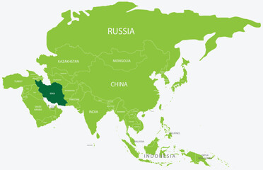 Highlighted green map of IRAN inside light green political map of Asia using orthographic projection on light blue background