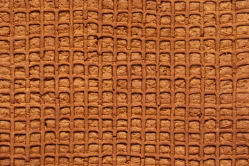 Close-up of Textured Brown Gingerbread, Symbolizing Festive Season Cooking and Holiday Celebrations