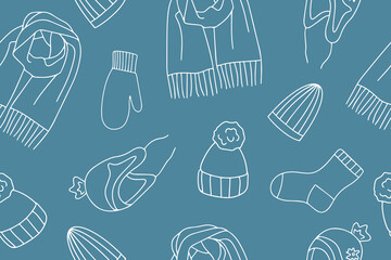 Warm knitted clothing set in doodle style. Collection of winter accessories in doodle style. Outline Hats, mittens, socks, scarves. Line hand drawn illustration. Vector illustration