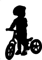 silhouette of a child riding a bike