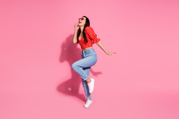 Full body portrait of nice young lady enjoy dancing wear top isolated on pink color background