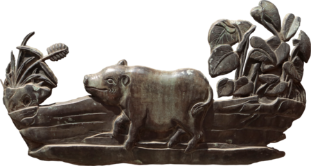 Pigs carved in relief in Hue architecture