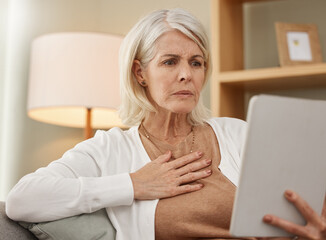Bad news, shock and tablet with senior woman on sofa in living room of retirement home for...