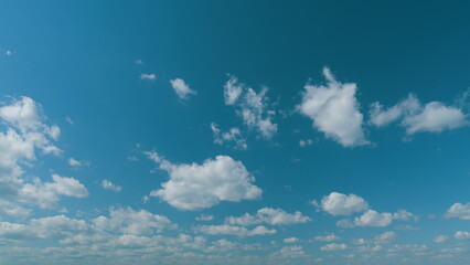 Nature Weather Blue Sky With Moving Cumulus Clouds. Slow Moving Cloudscape. Weather Concept.