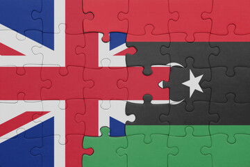 puzzle with the colourful national flag of libya and flag of great britain.