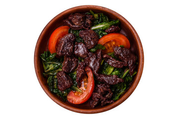 Delicious warm salad of chicken liver, spinach, arugula, tomatoes