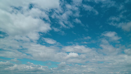 Layers Of Different Cloud Types With Blue Skies Cloudscape Background. Water Vapor Condense To Form...