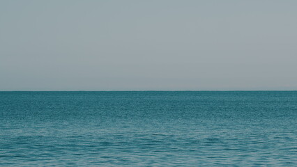 Turquoise Sea Color. Disturbed Blue Ocean Water Surface.