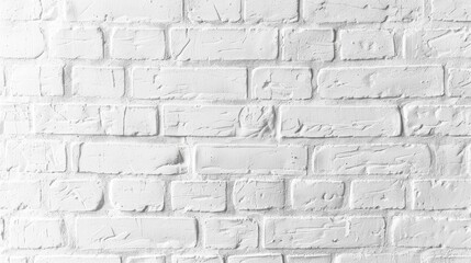 A white brick wall with a few black spots