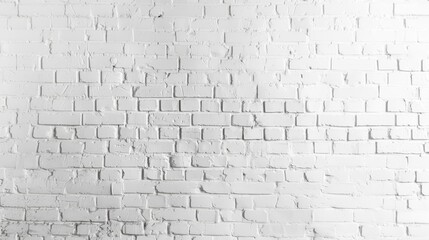 A white brick wall with a few black spots