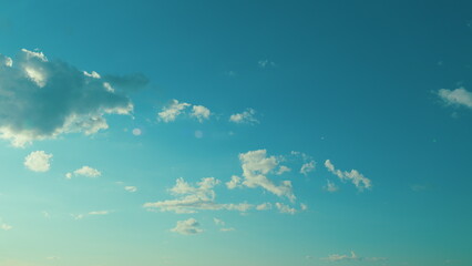 Beautiful Blue Sky With Clouds. Beautiful White Cumulus Clouds In Blue Sky With Sunlight.