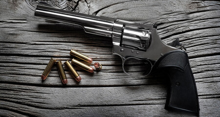 Handguns Pistols on Old Wood Weapons for Self Defense © Lane Erickson